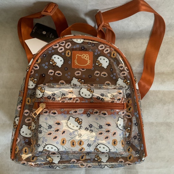 Hello Kitty Handbags - NWT Hello Kitty Clear Mini Backpack - All Over Floral Hello Kitty Print